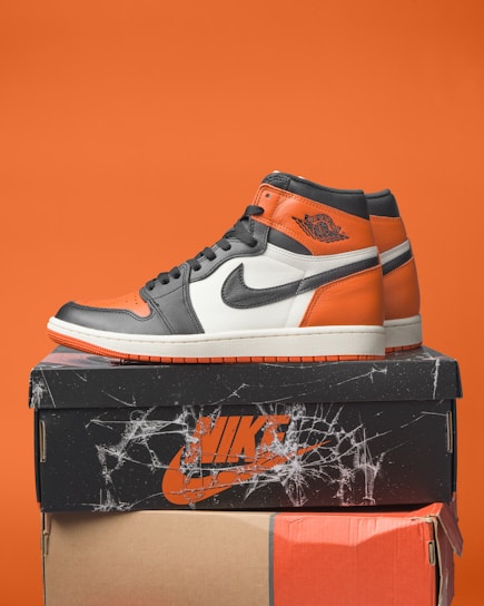 Air jordan 1 sneakers on top of boxes.