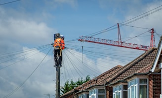 A lineman works on power lines.