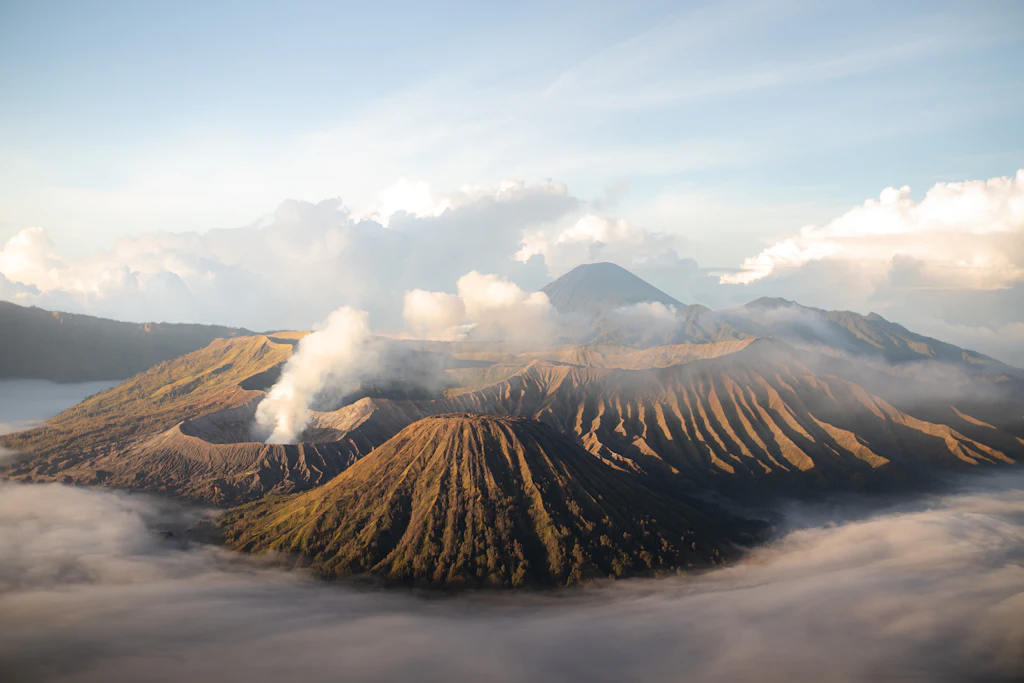 Mount Bromo and neighbouring volcanic cones rising through low cloud in East Java