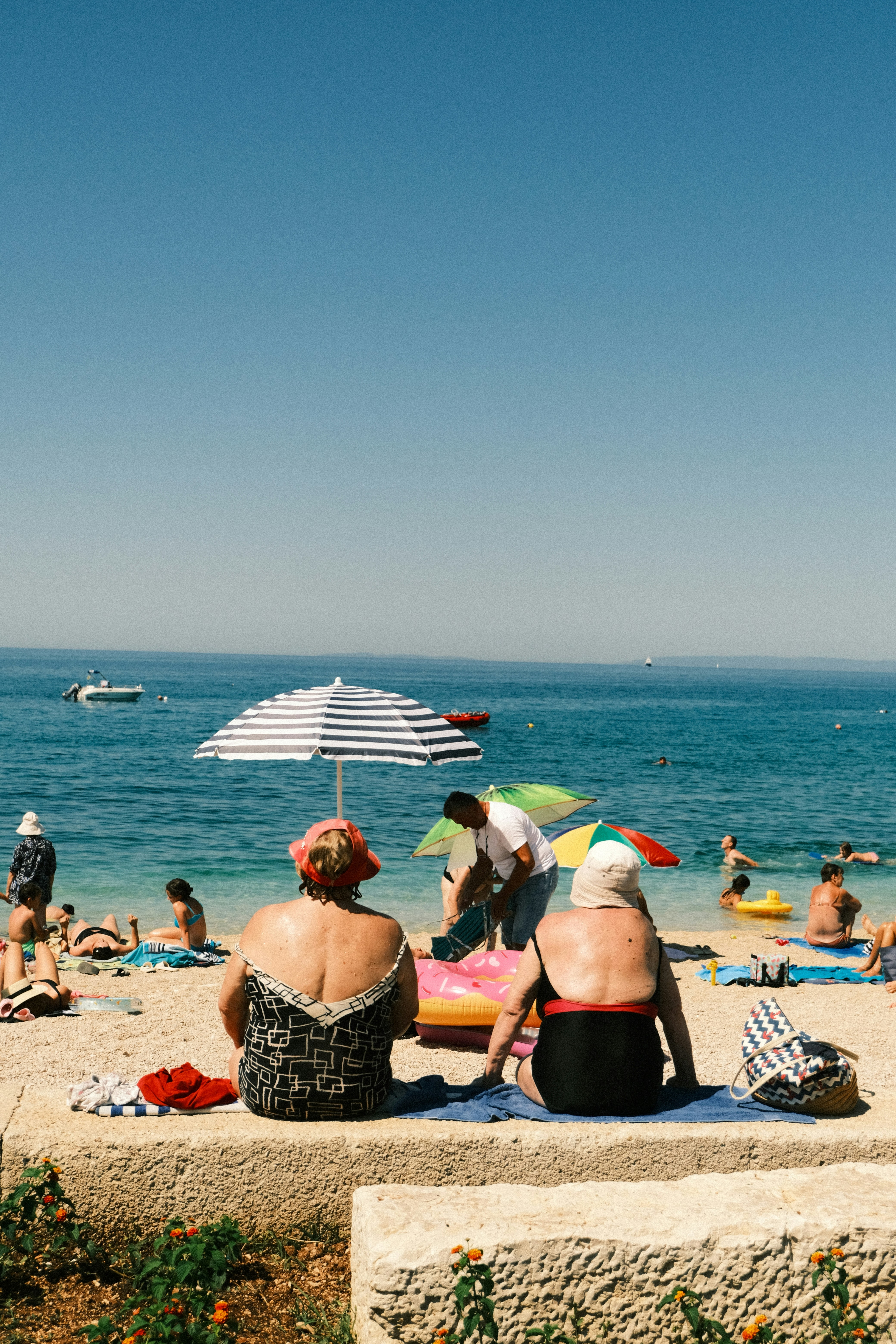 People are enjoying a sunny day at the beach