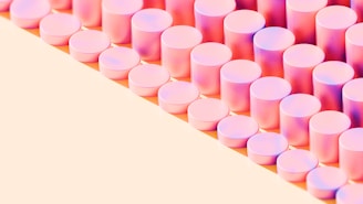 Pink cylinders arrange in a diagonal pattern.