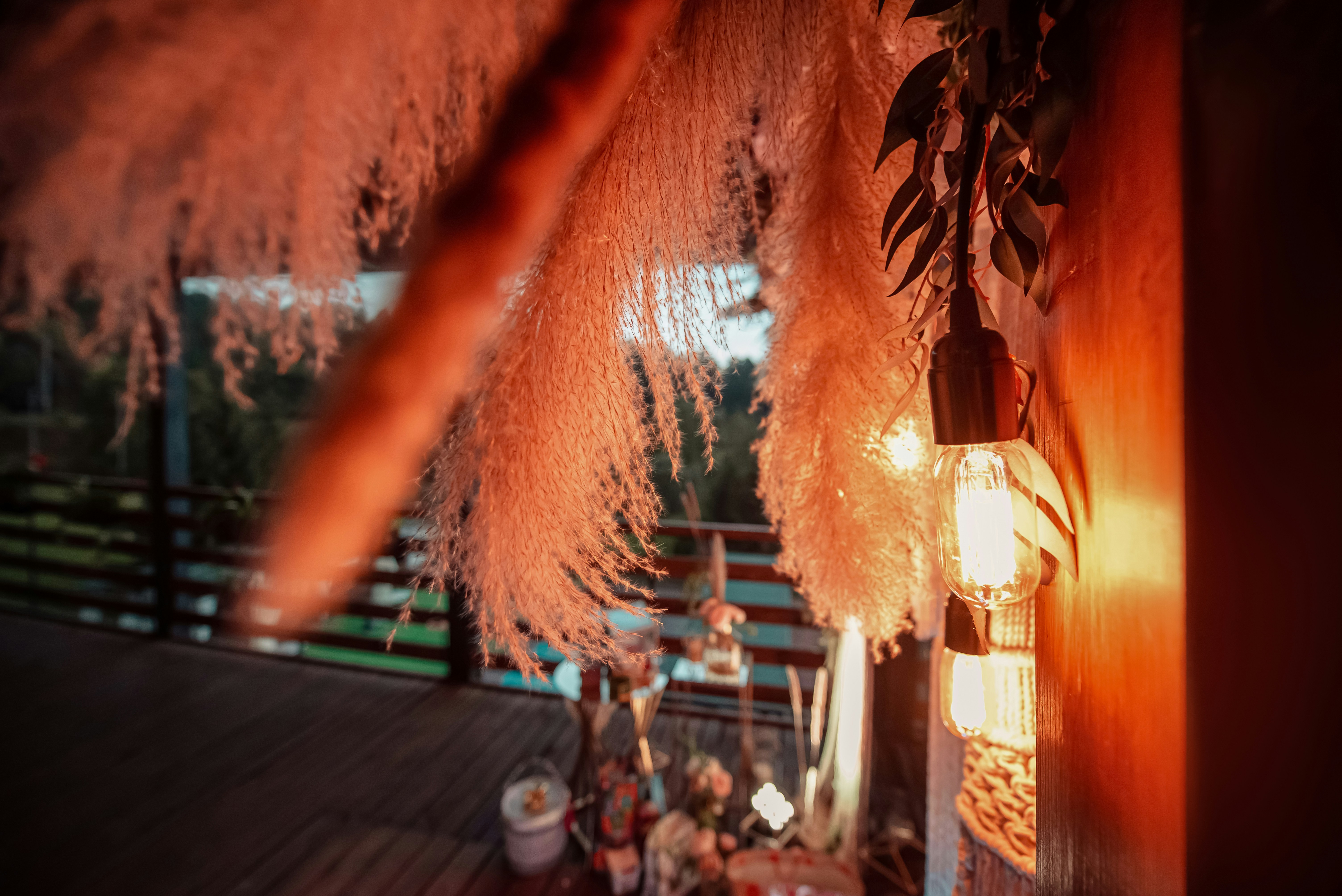 Warm lighting and decorations create a cozy ambiance.