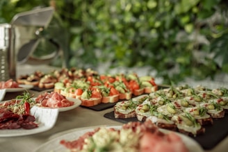 Buffet with delicious looking appetizers and snacks.