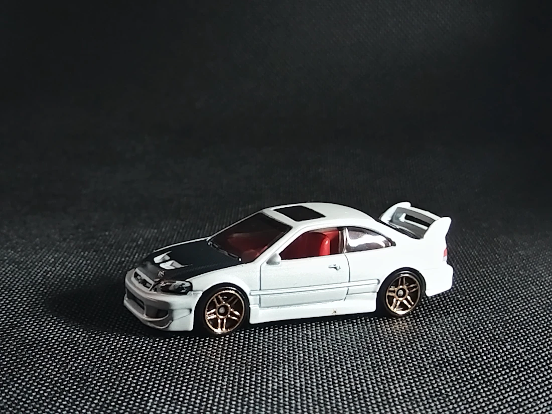 Machetă diecast de referință: Honda Civic S1. Imagine ilustrativă, fără stoc confirmat.
