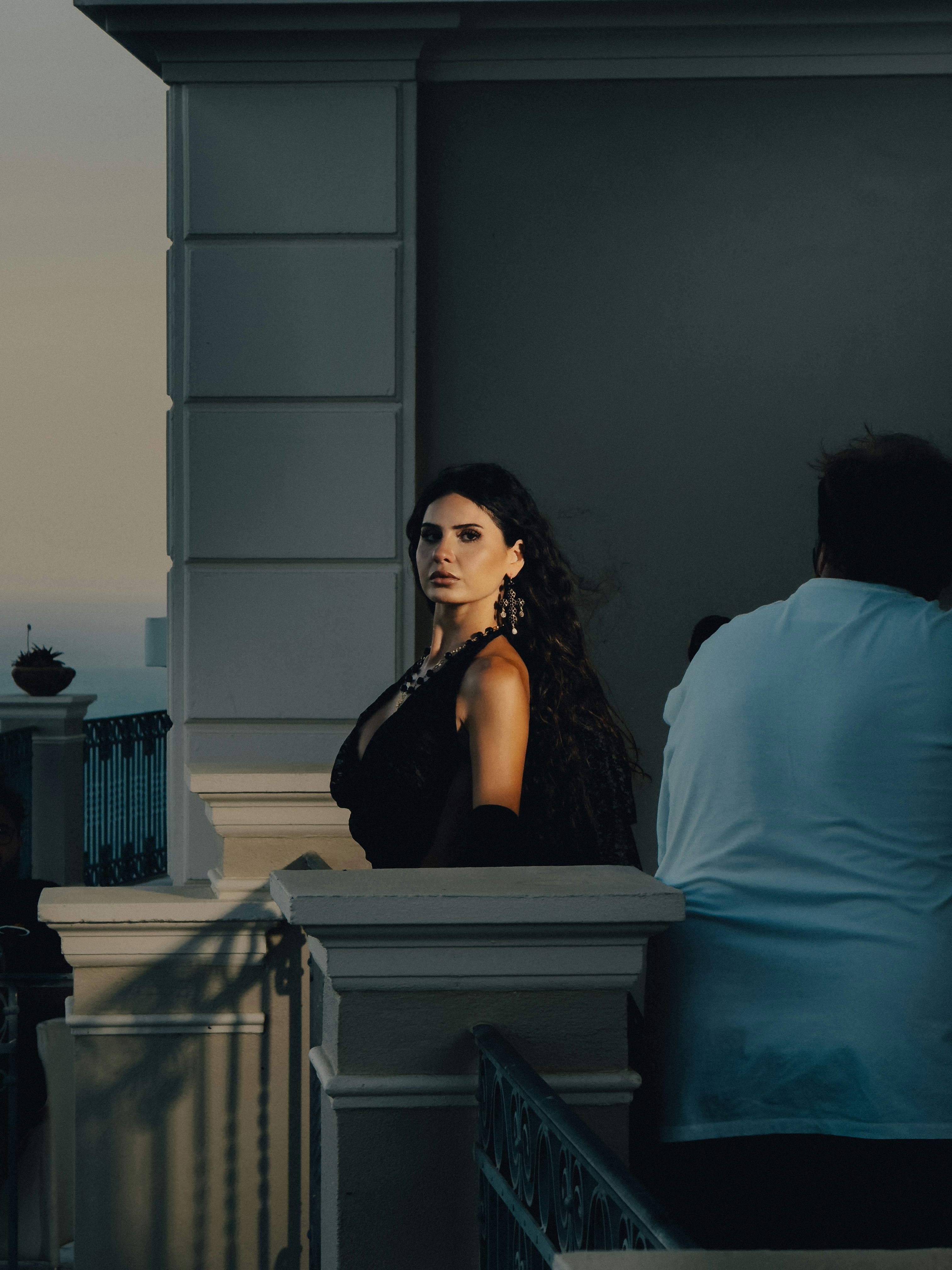 Woman in a black sequin saree