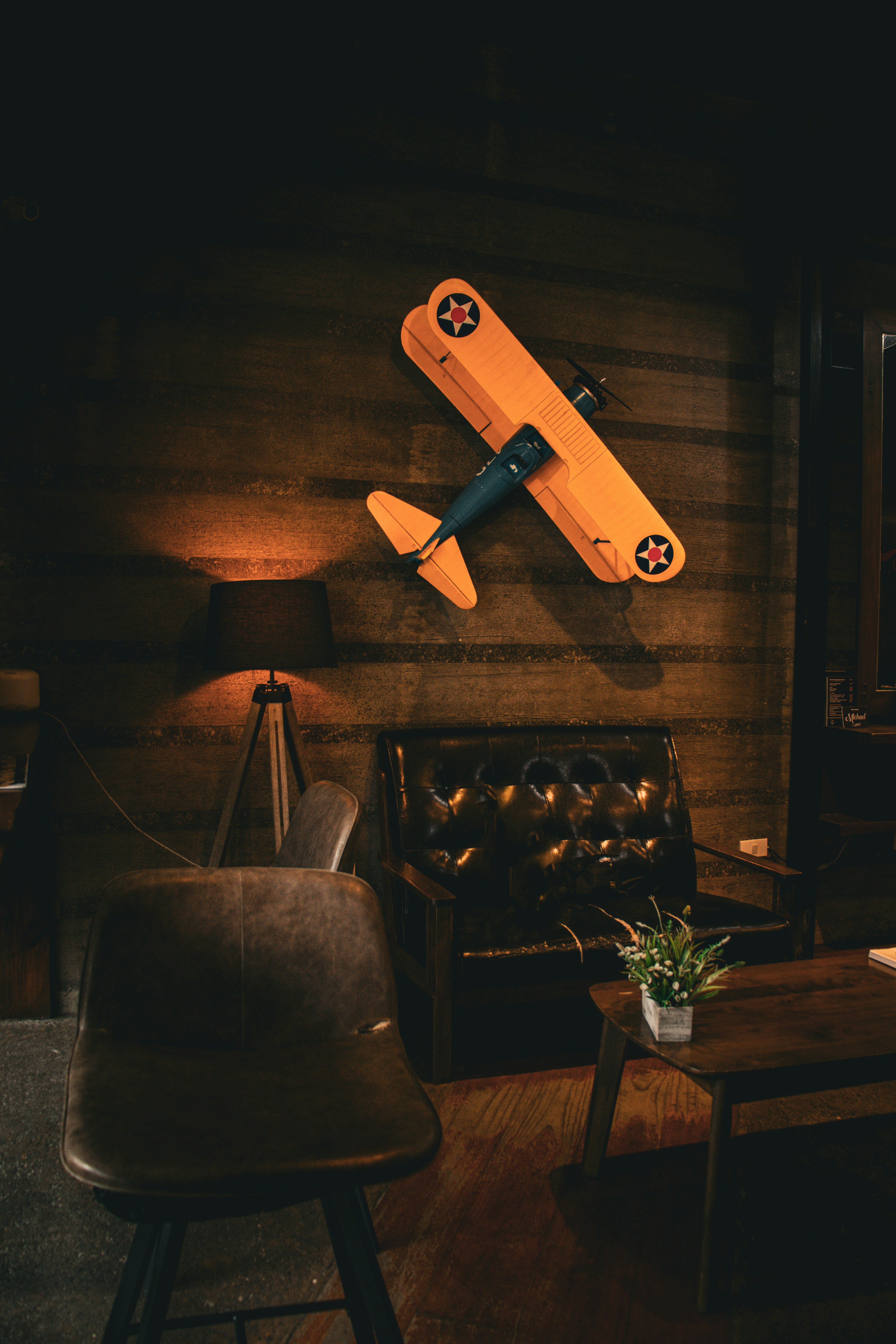 A cozy room featuring an airplane decoration.