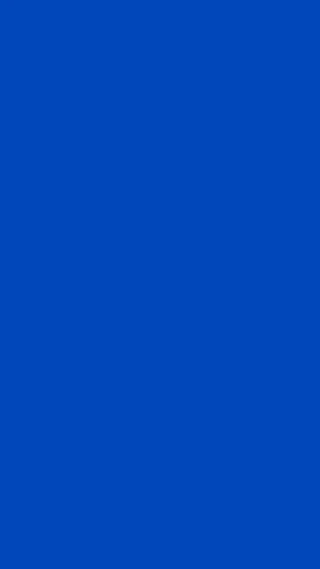 Solid blue background.