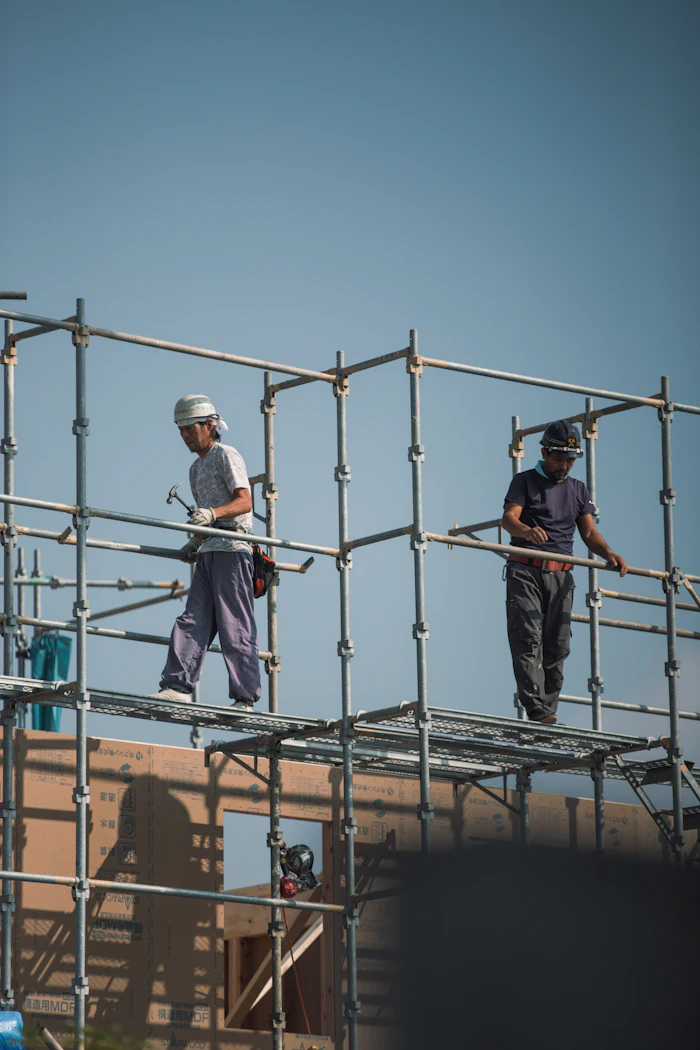 Crew building staging structure for an event