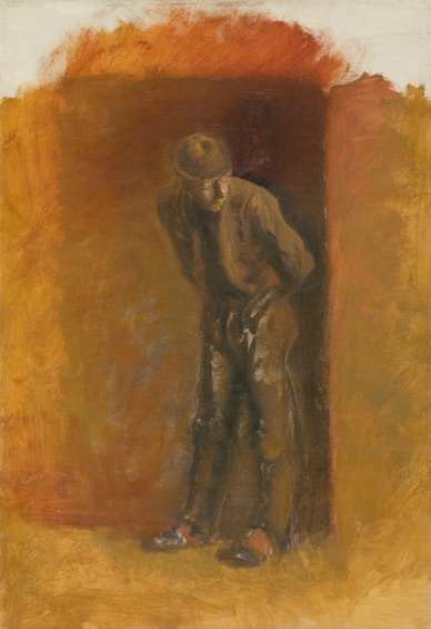 A lone figure stands in a dimly lit, earthy-toned space.