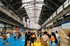 Large event is taking place inside a massive hall.