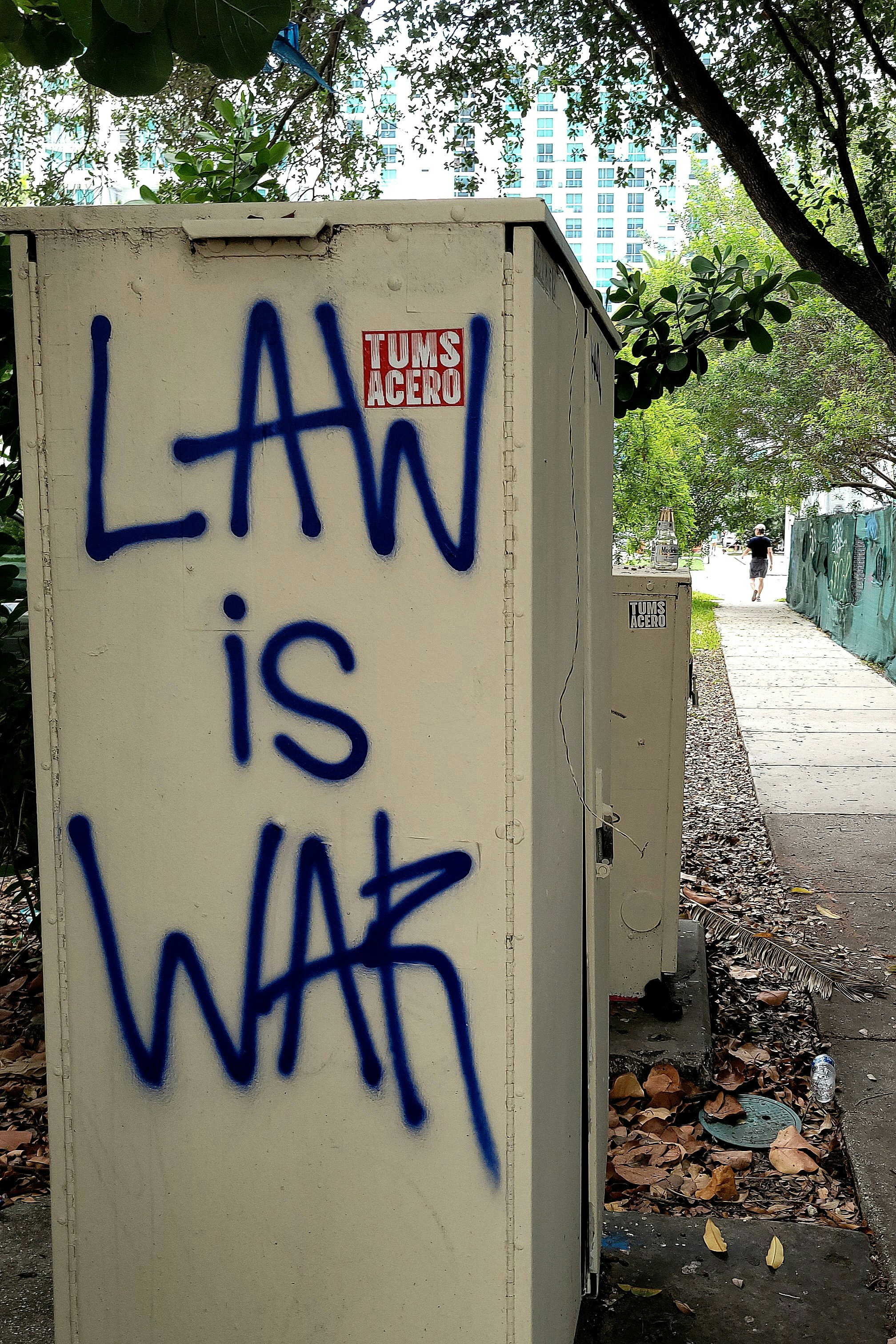 Graffiti on a box reads 