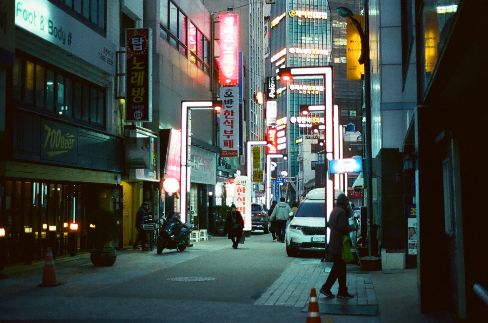 Neon-lit street photographed on CineStill 800T film