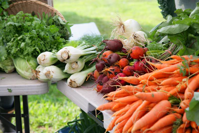 Fresh vegetables and farm produce displayed on a table