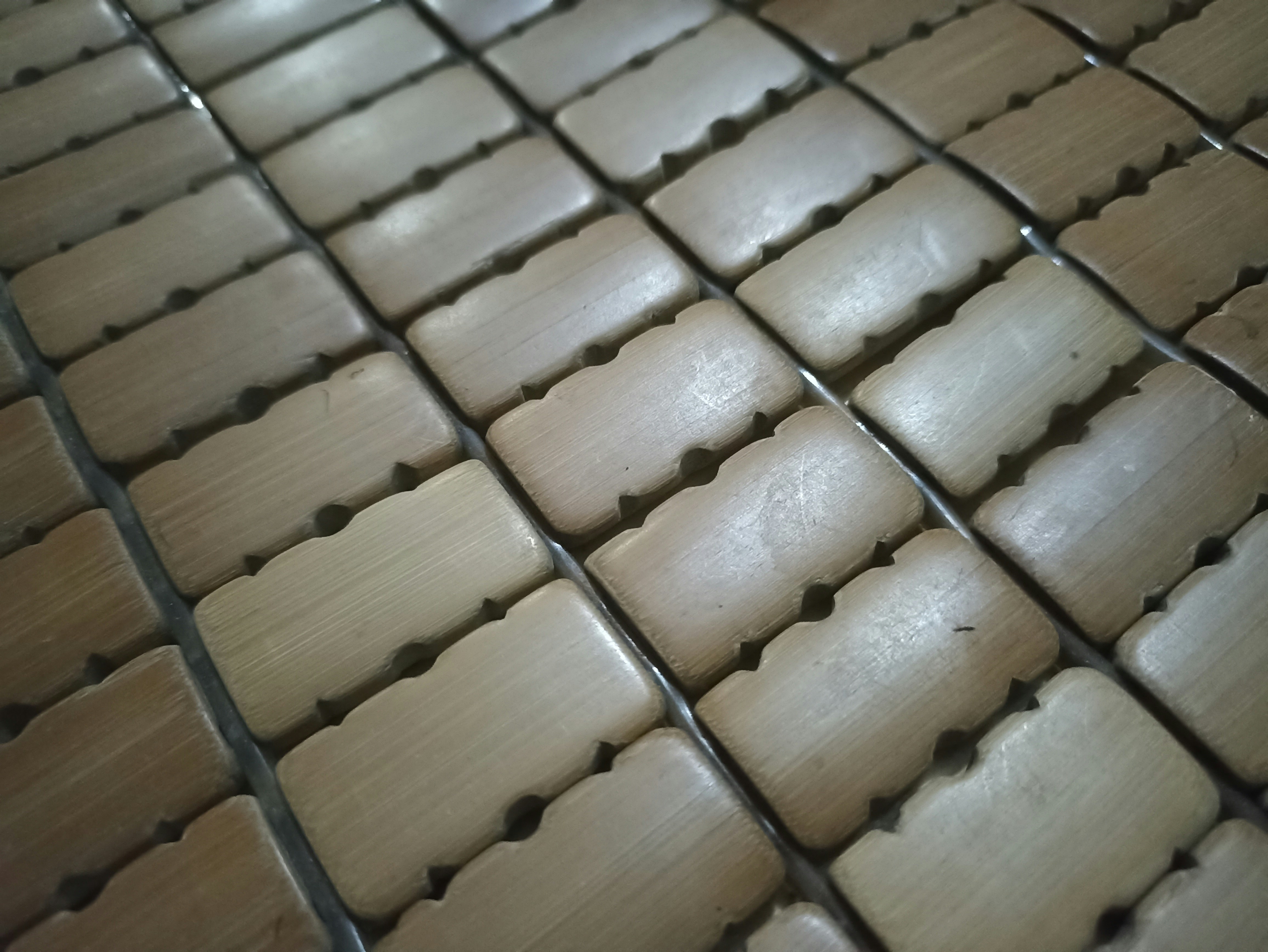 Close-up of a rectangular bamboo mat.