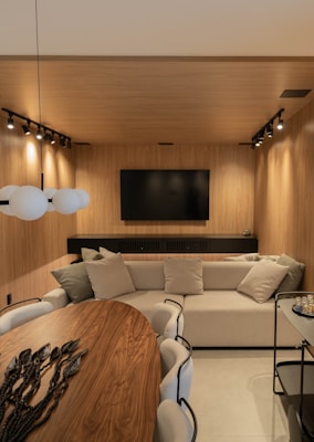 A modern living room with a sleek, wooden design.