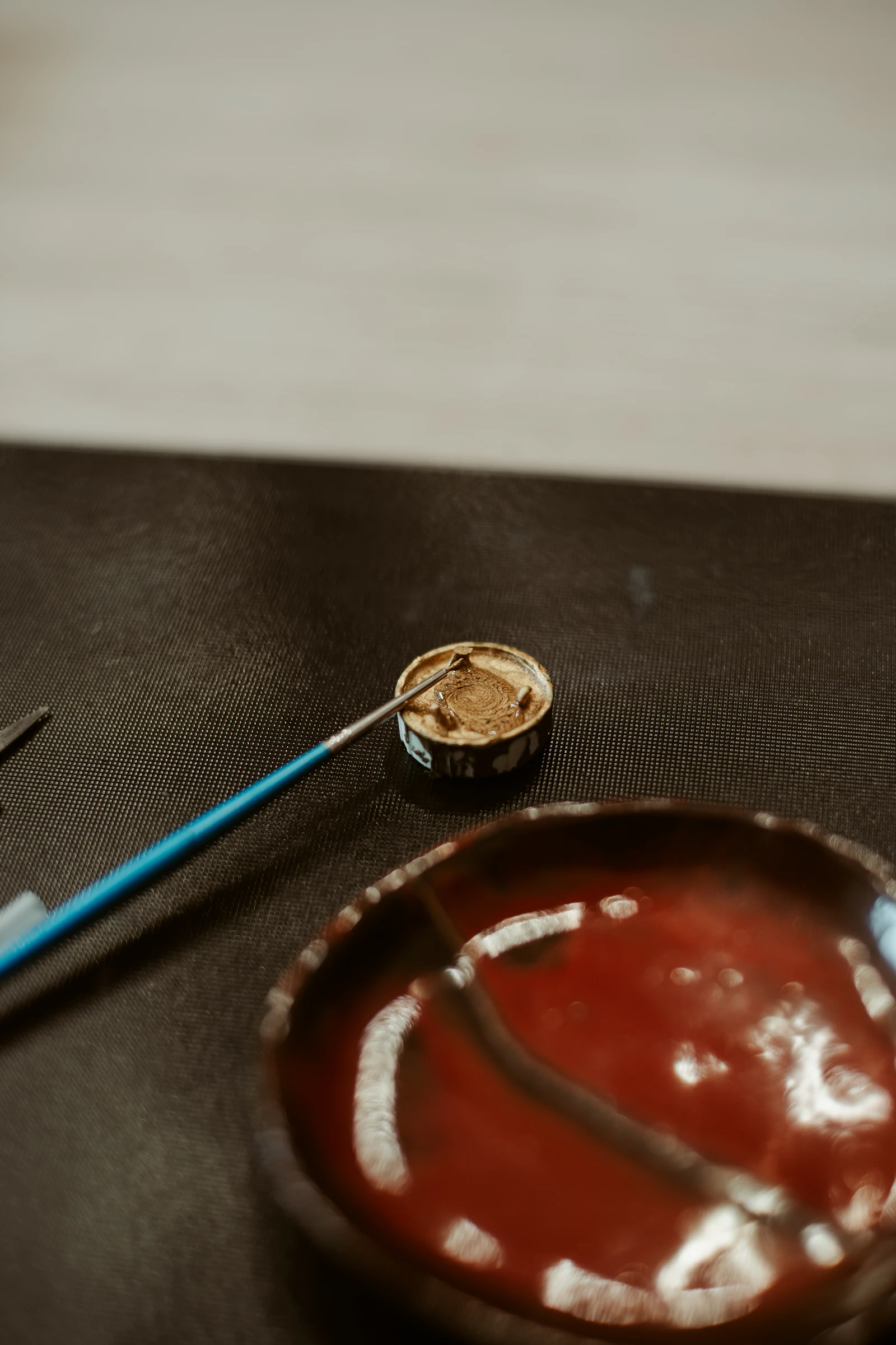 A kintsugi bowl: golden joinery, the Japanese practice of mending broken pottery with lacquer and gold