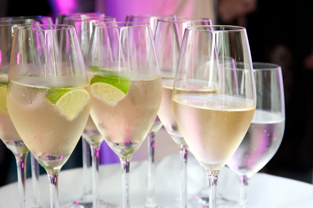 Champagne glasses with citrus garnish
