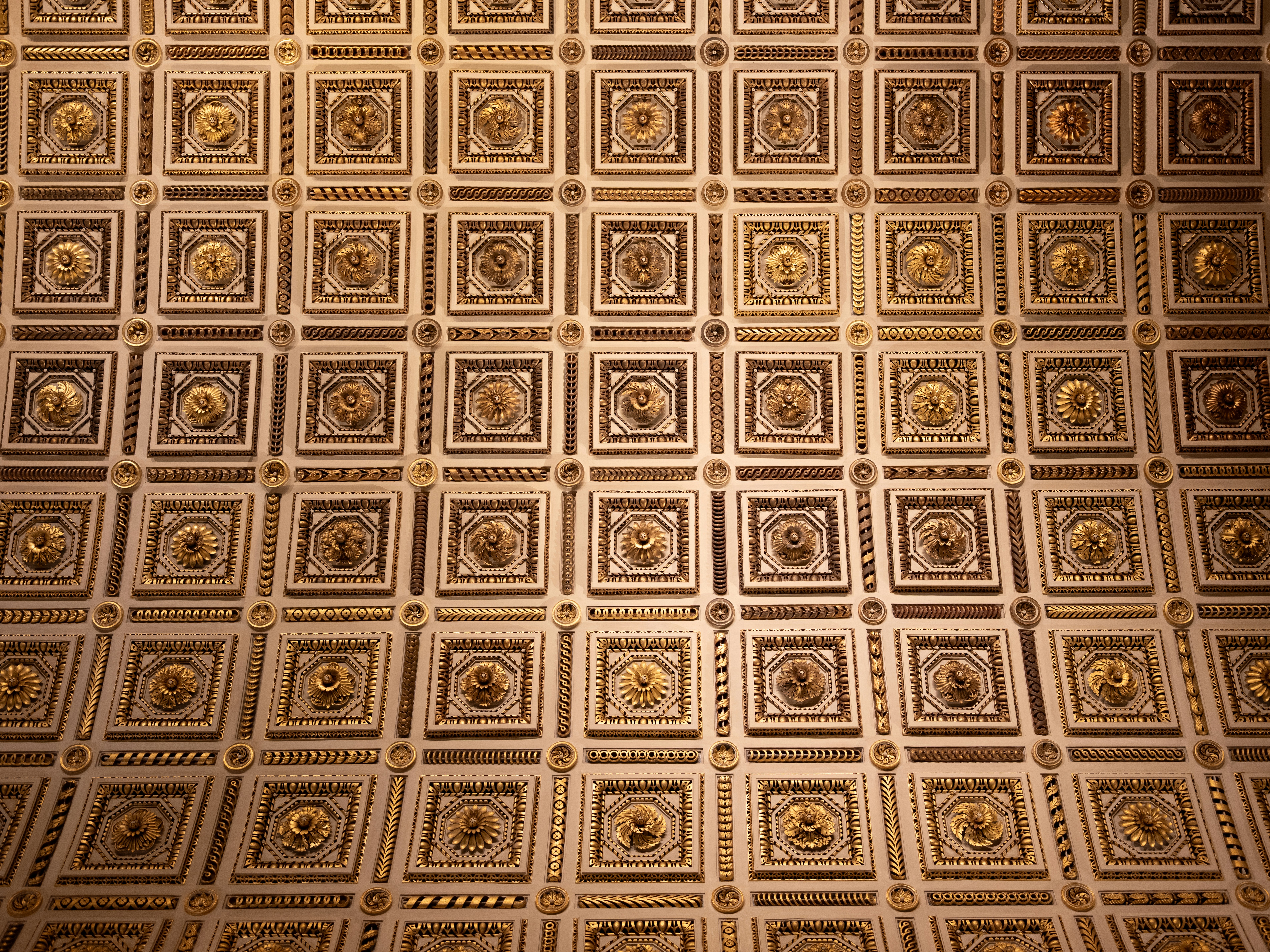 Close-up of an elaborately decorated golden ceiling