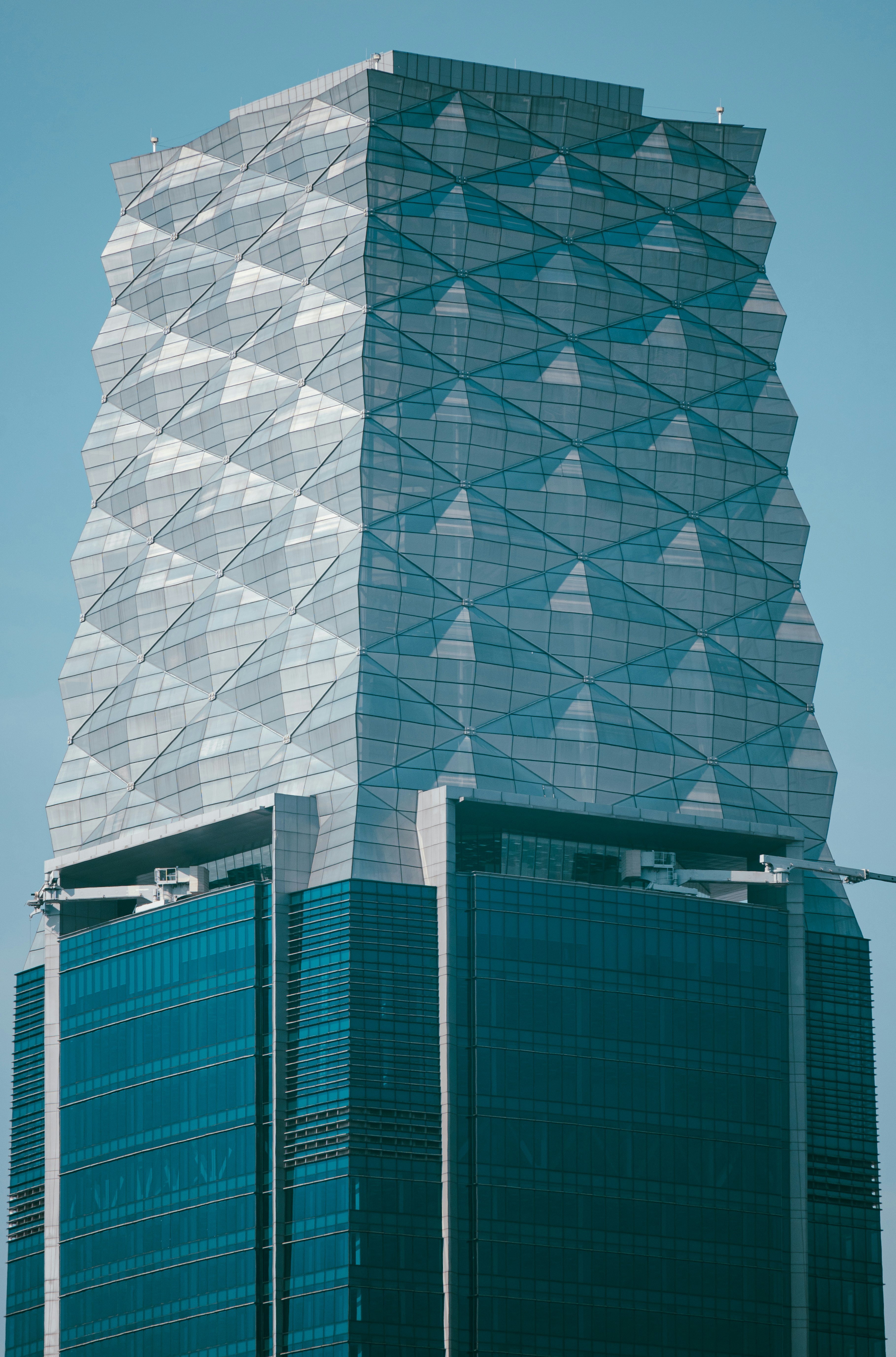 A modern skyscraper with unique, geometric design.