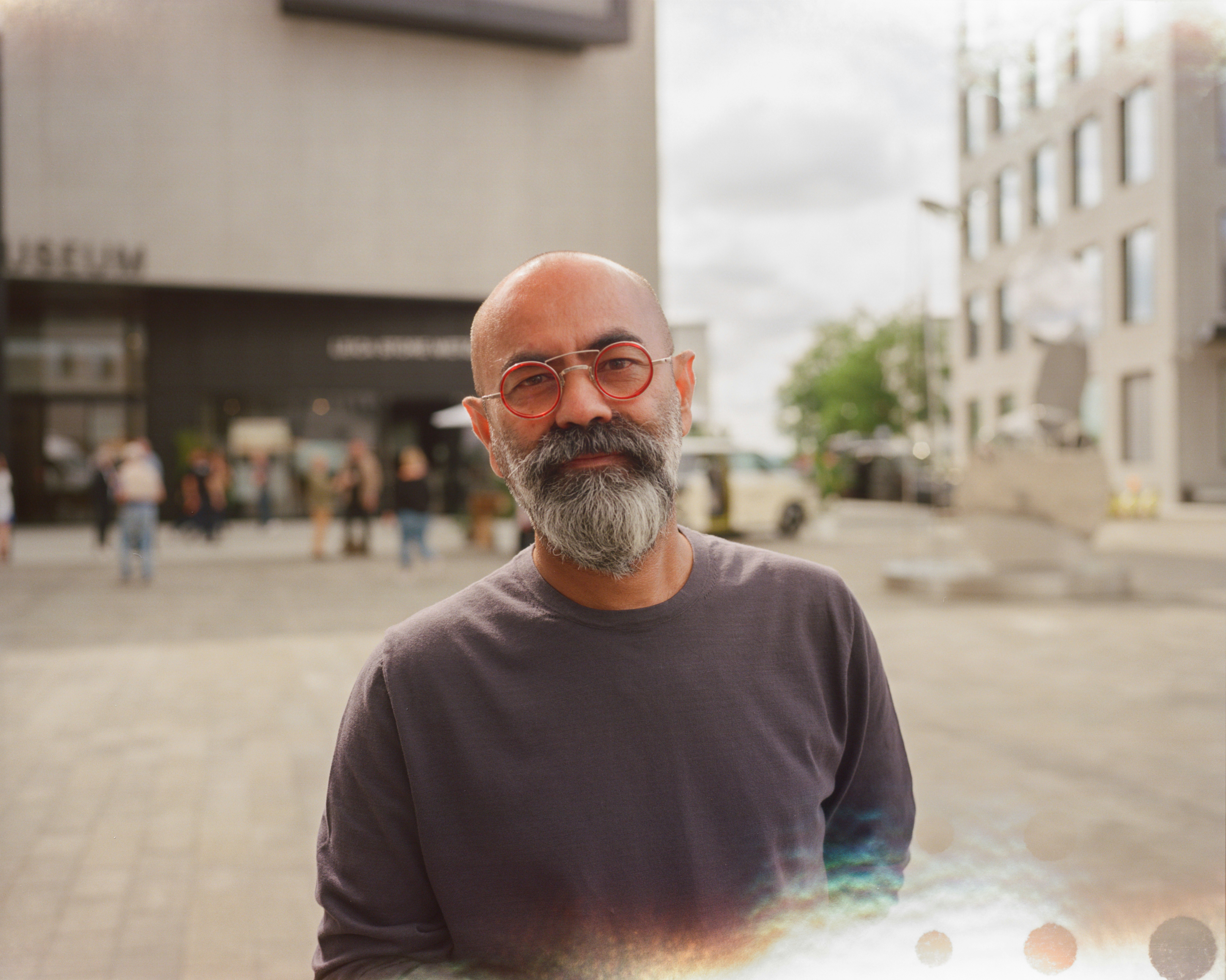 Man in front of building
