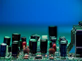 Circuit board filled with electronic components.