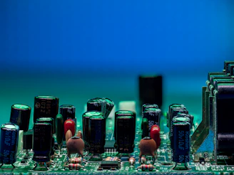 Circuit board filled with electronic components.