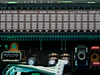 A digital display shows radio station and settings.