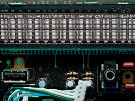 A digital display shows radio station and settings.