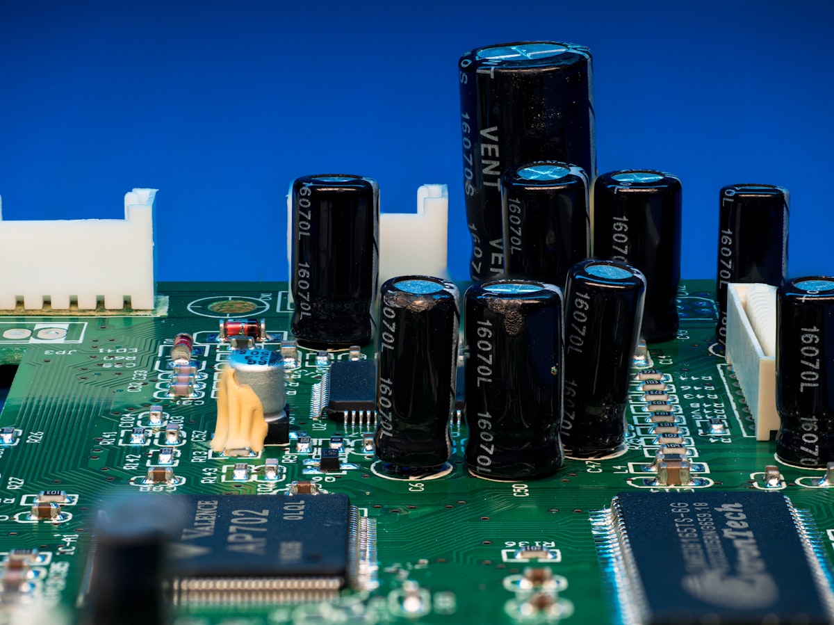 Electronic circuit board with semiconductor chips and components in close-up view representing the chip industry recovery