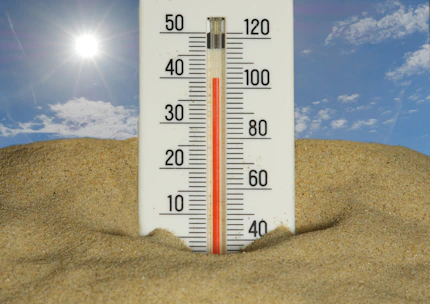 The thermometer shows a very hot temperature.