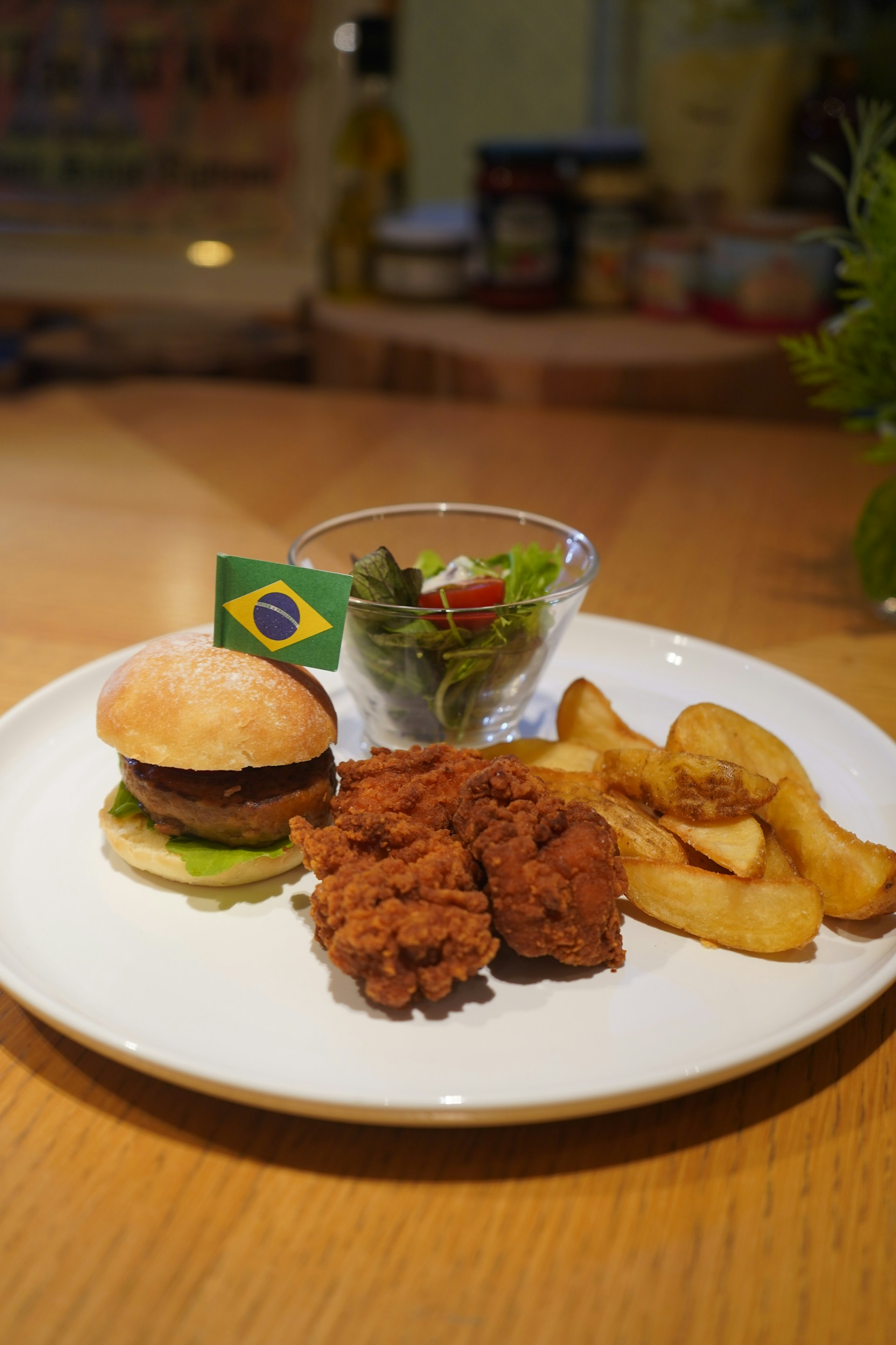 A plate of brazilian-themed food is served.
