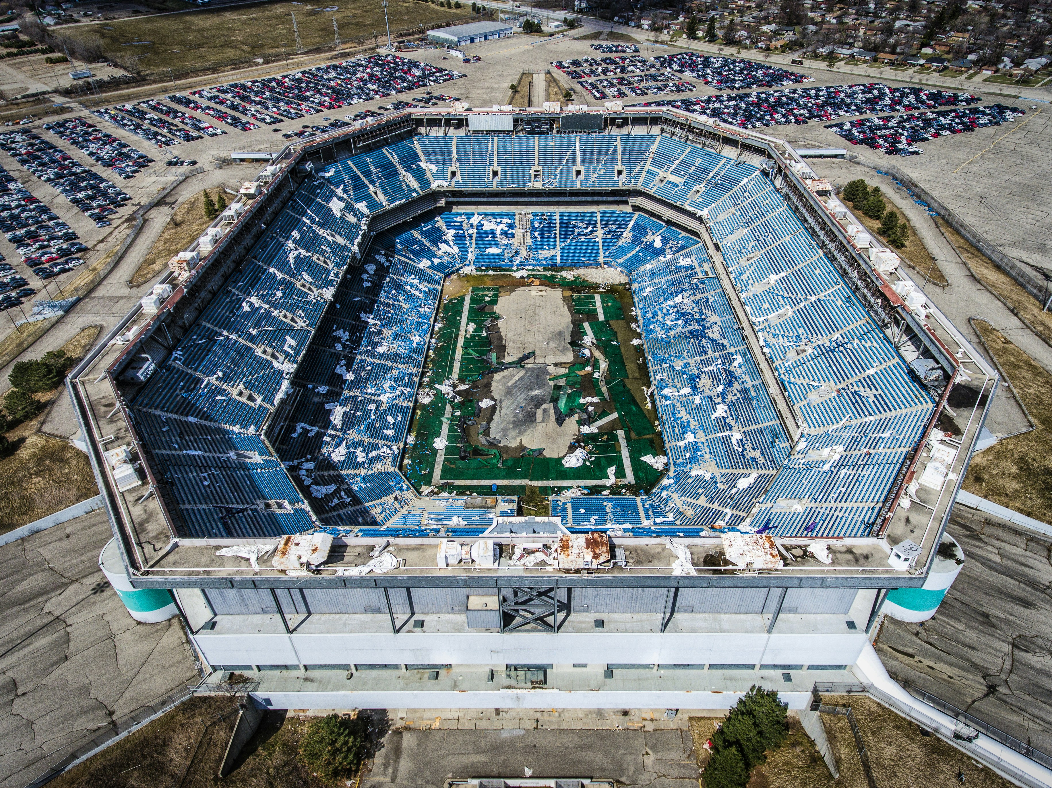 Abandoned stadium shows decay and disrepair. photo – Free Drone Image on  Unsplash, image size:3000x2249