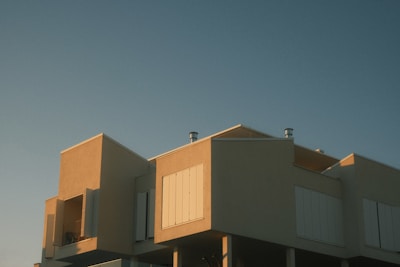Building exterior bathed in warm sunlight.