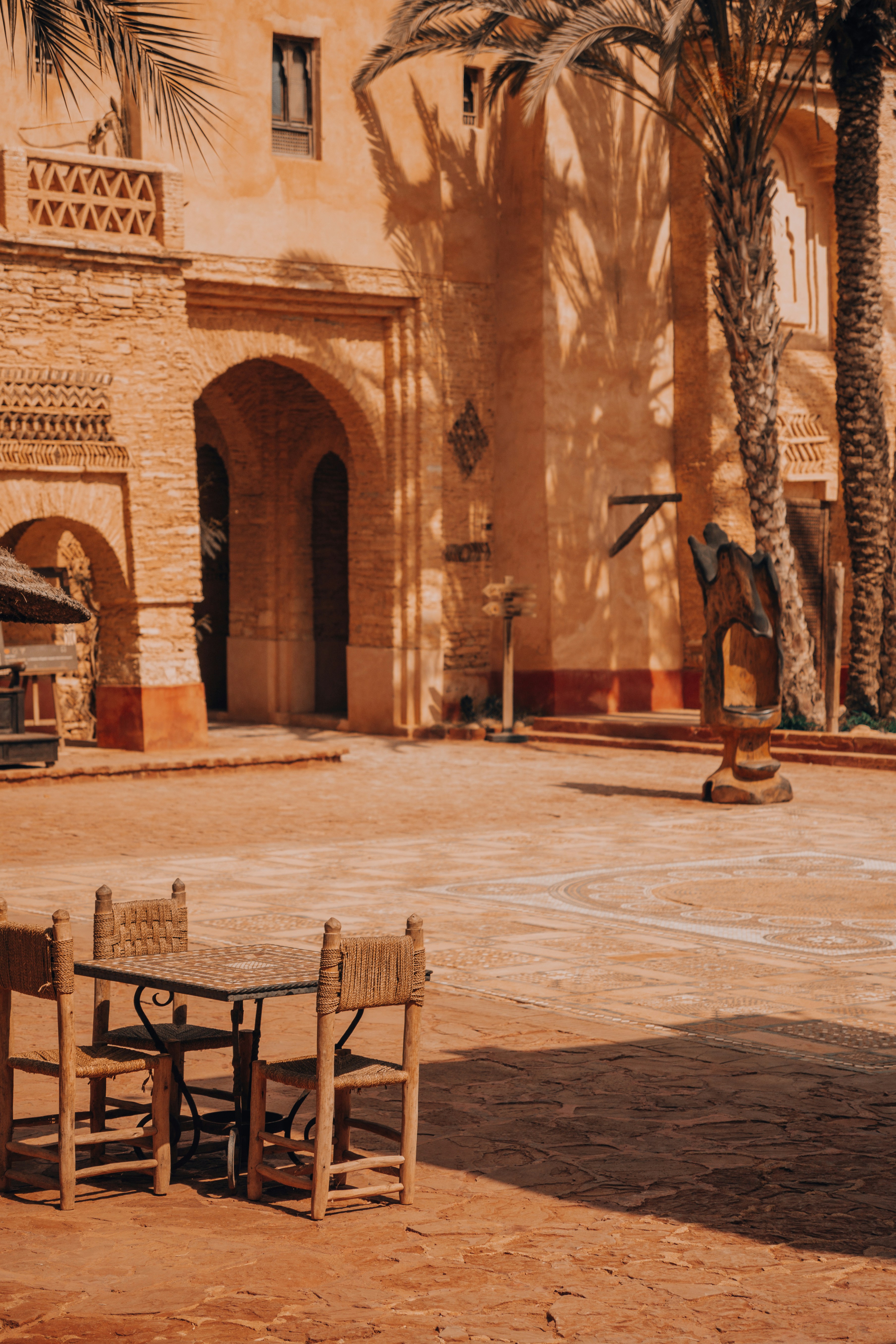 An exterior shot of a traditional moroccan courtyard.