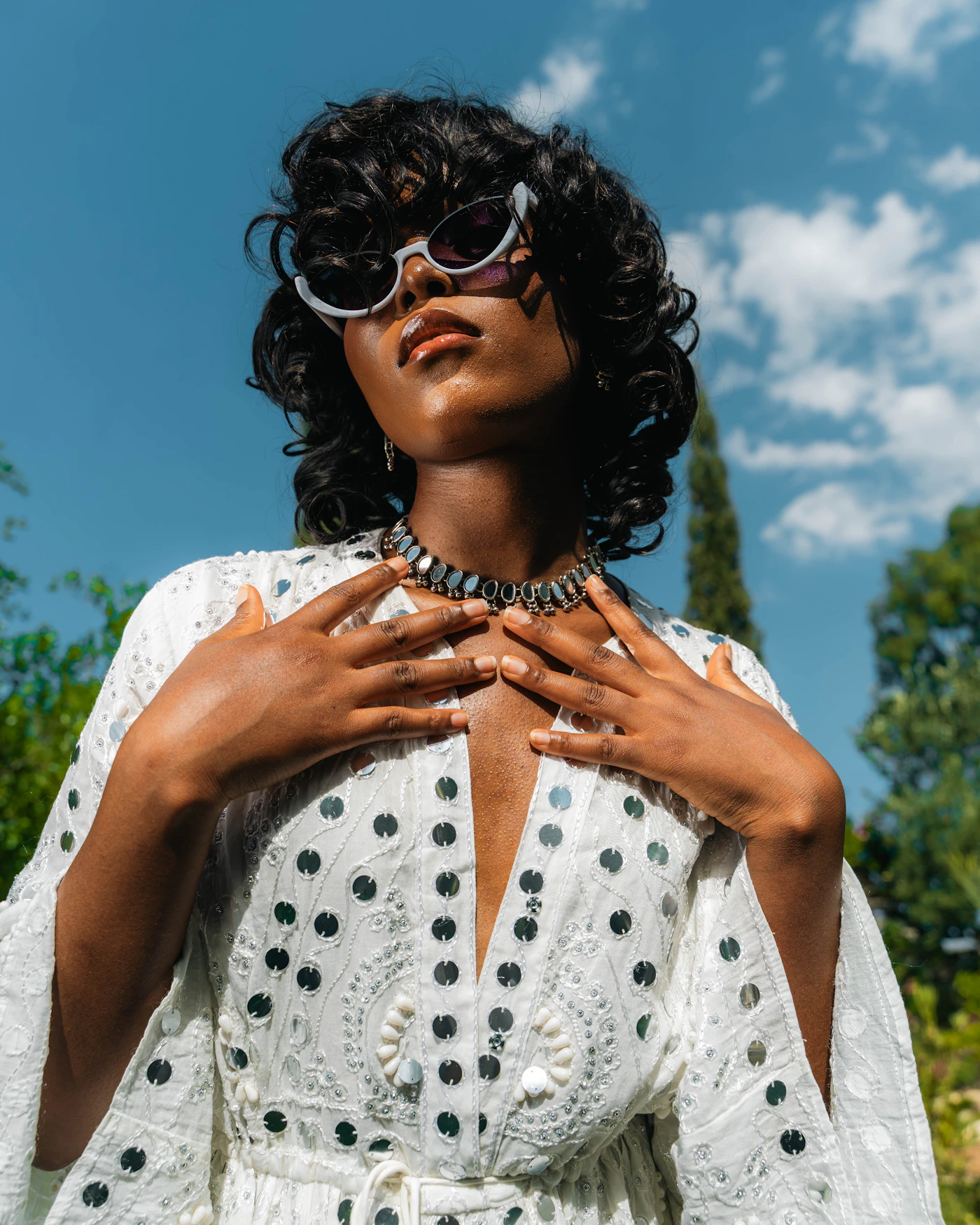 Editorial portrait featuring statement sunglasses