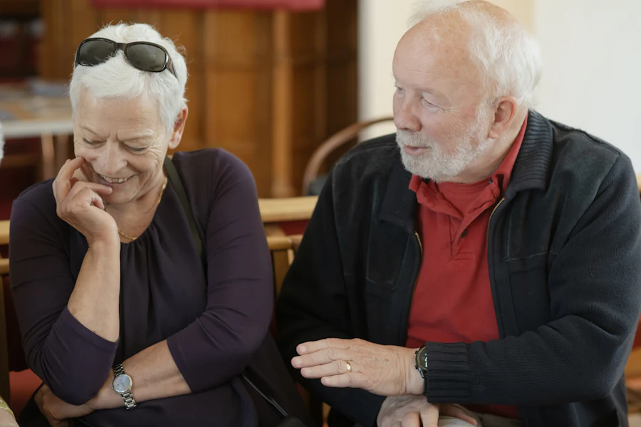 Older couple talking and smiling