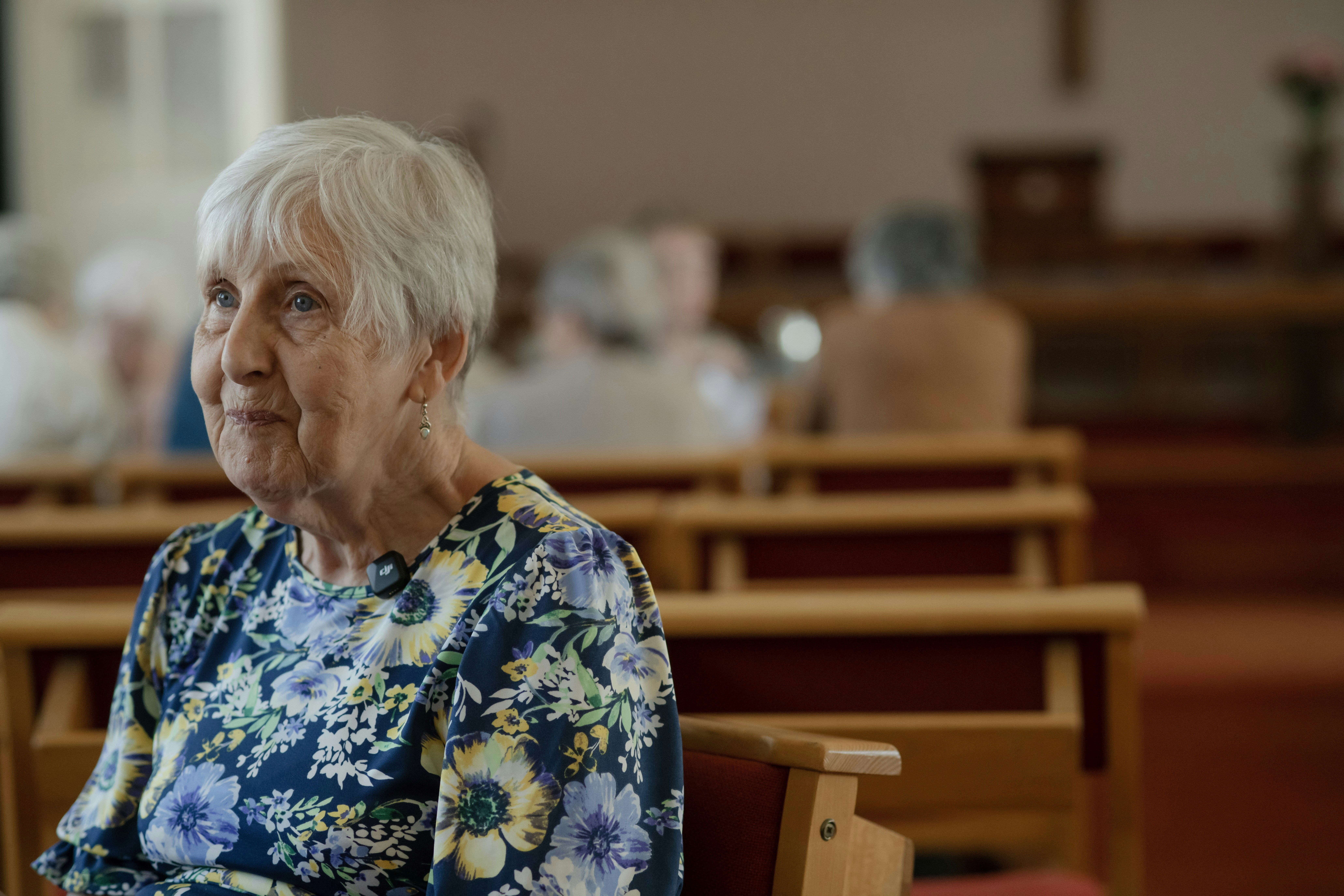 Elderly woman in church testimonial