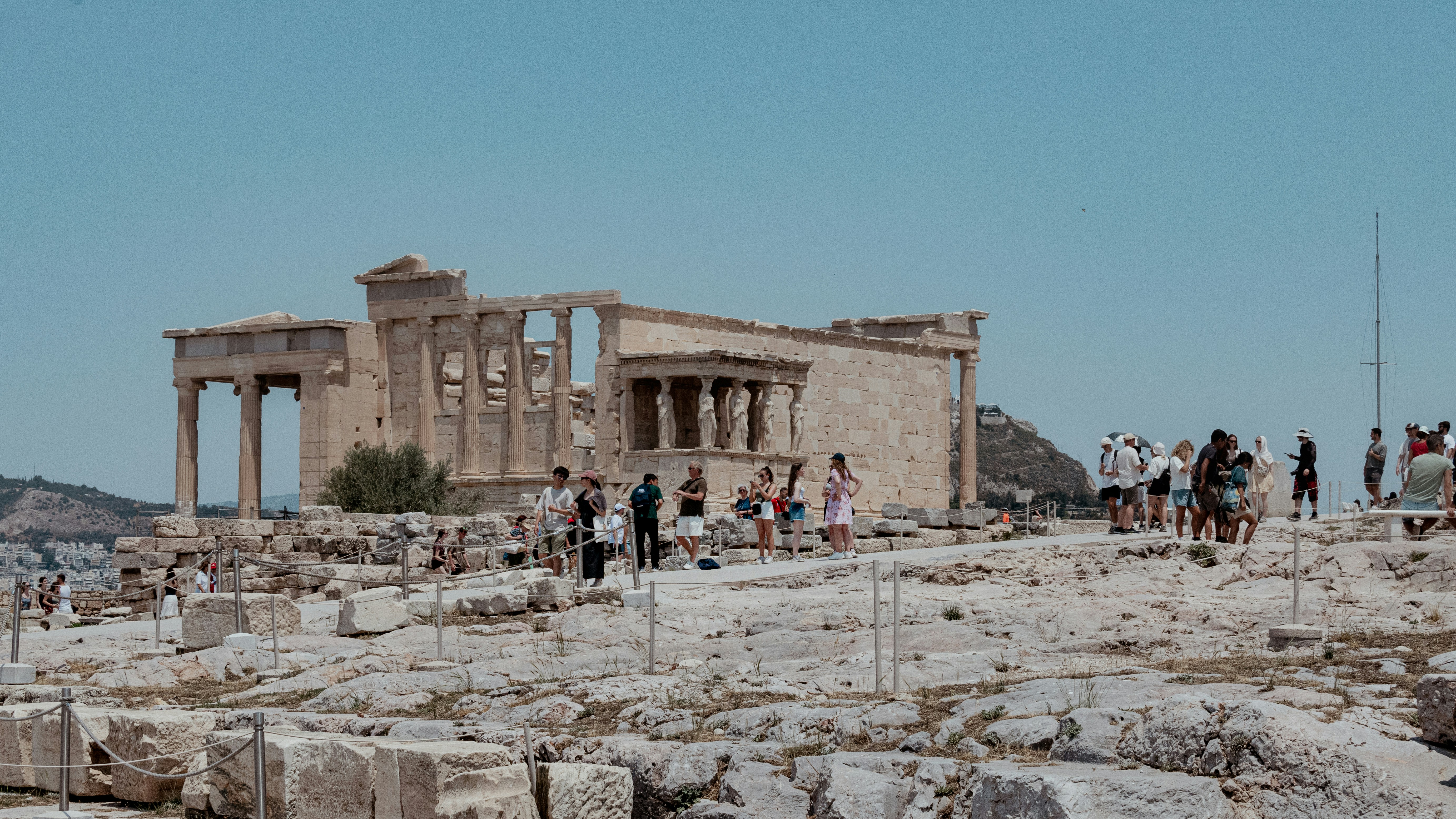 People visit the ancient ruins of the acropolis.