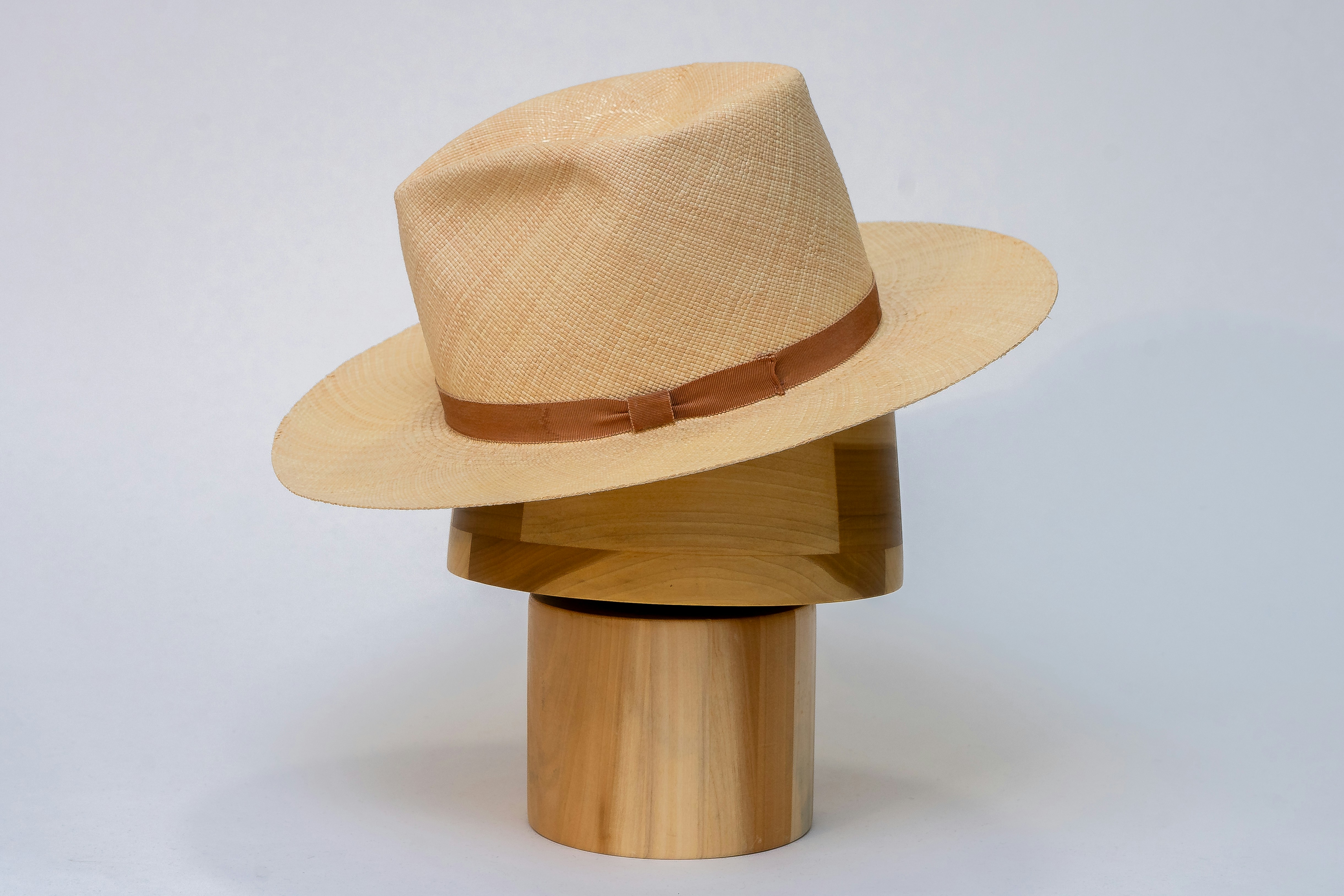 A black baseball cap with an embroidered logo.