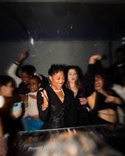 People are partying and dancing at a club.