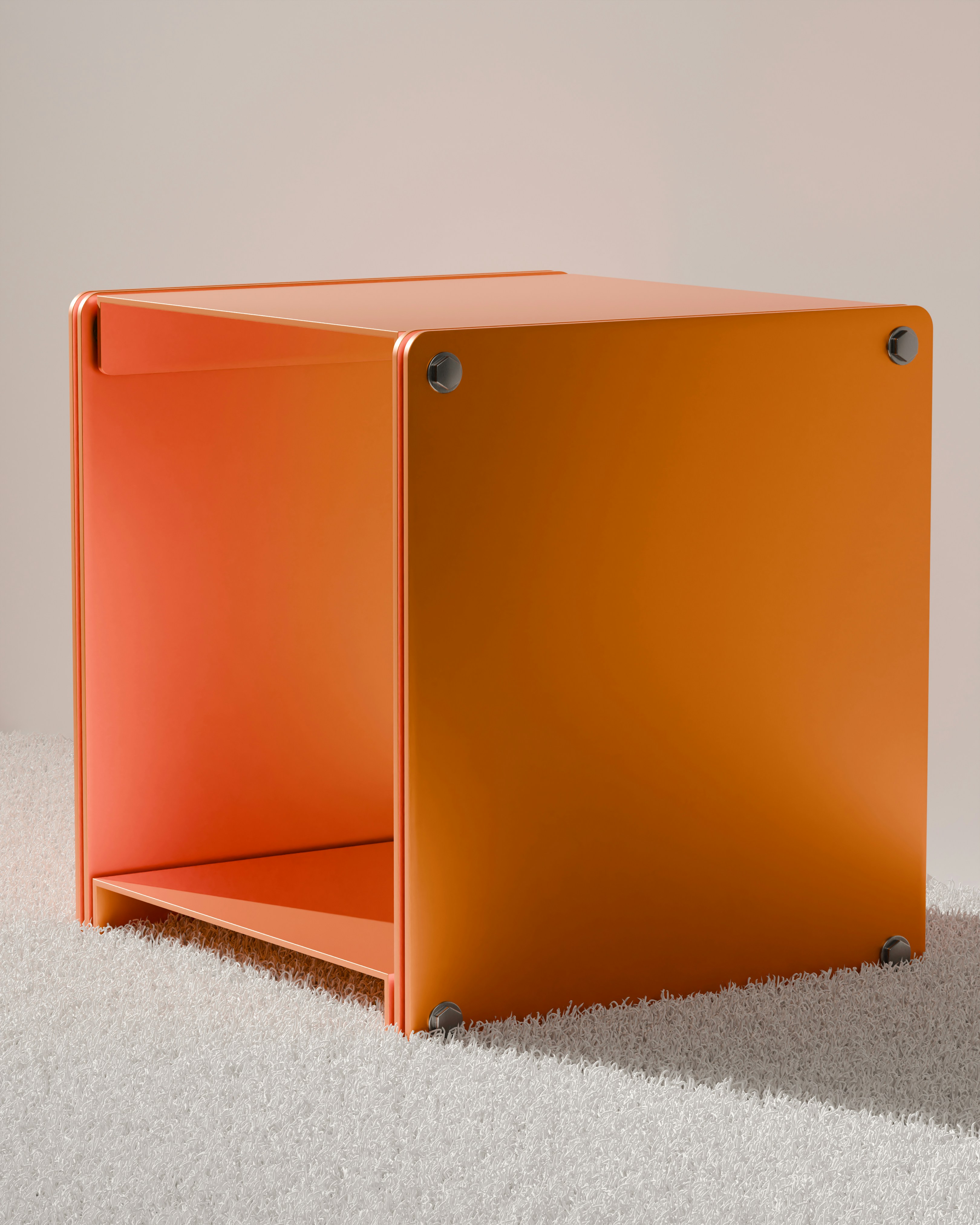 A bright orange cube-shaped shelf.