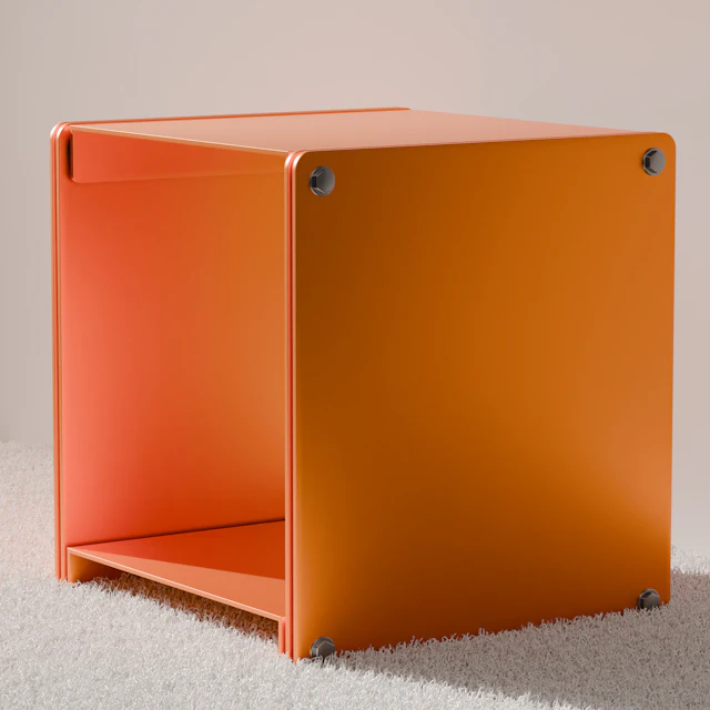 A bright orange cube-shaped shelf against a plain background