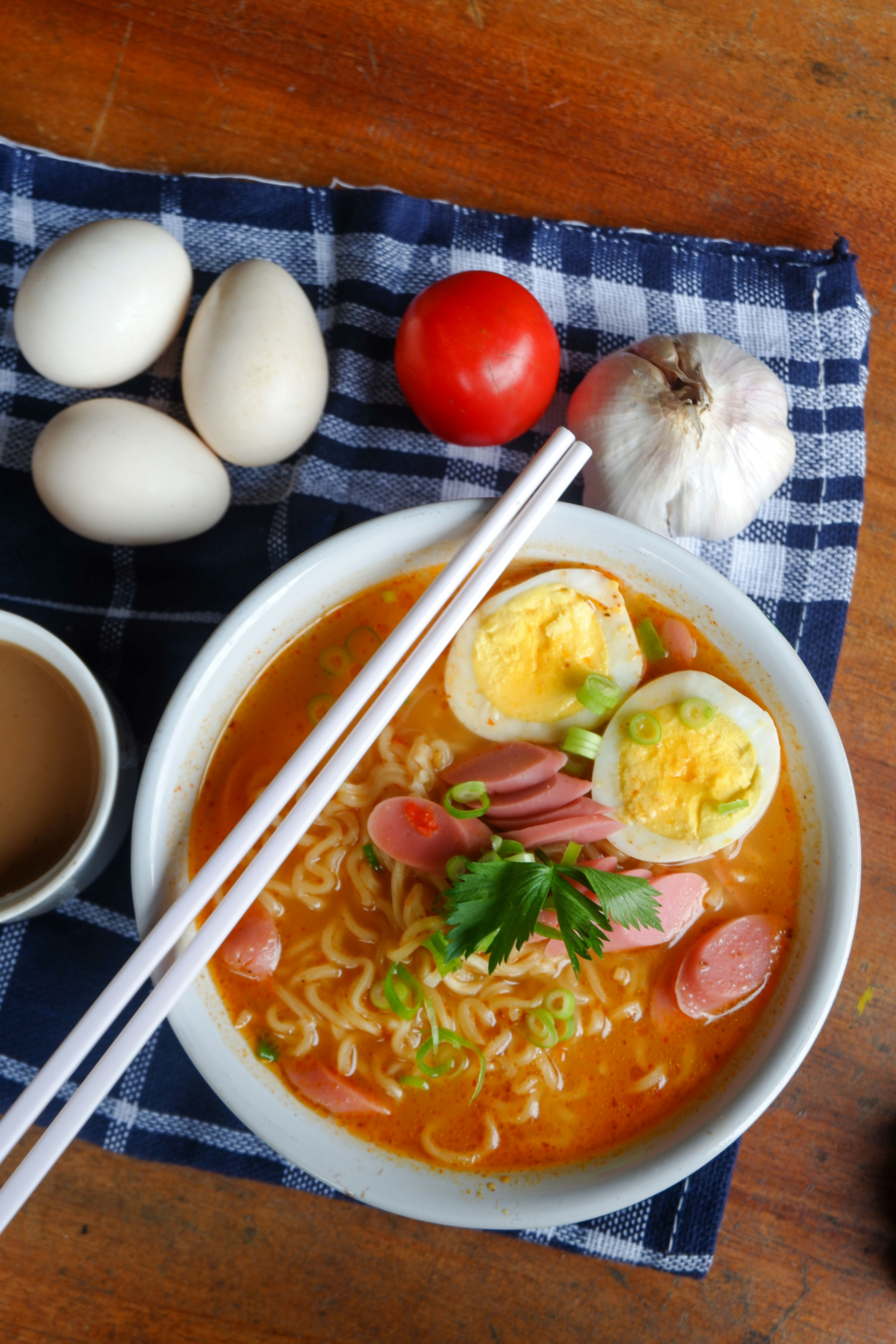 Noodles with eggs, sausage, and ingredients.