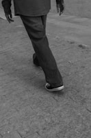 A person walks away from the camera.