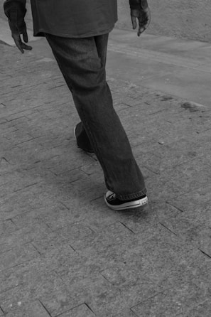 A person walks away from the camera.