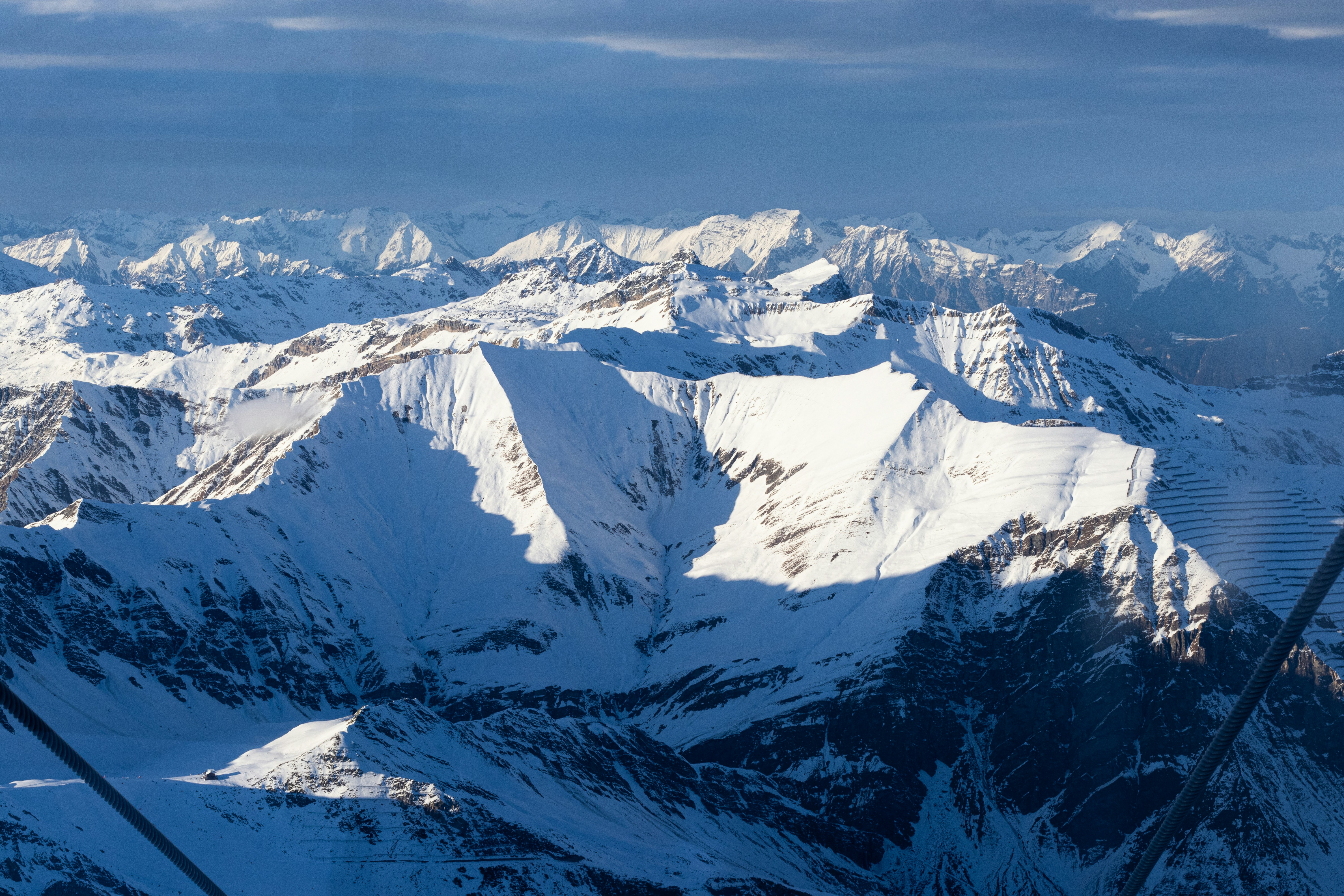Snowy mountains under a beautiful, blue sky.