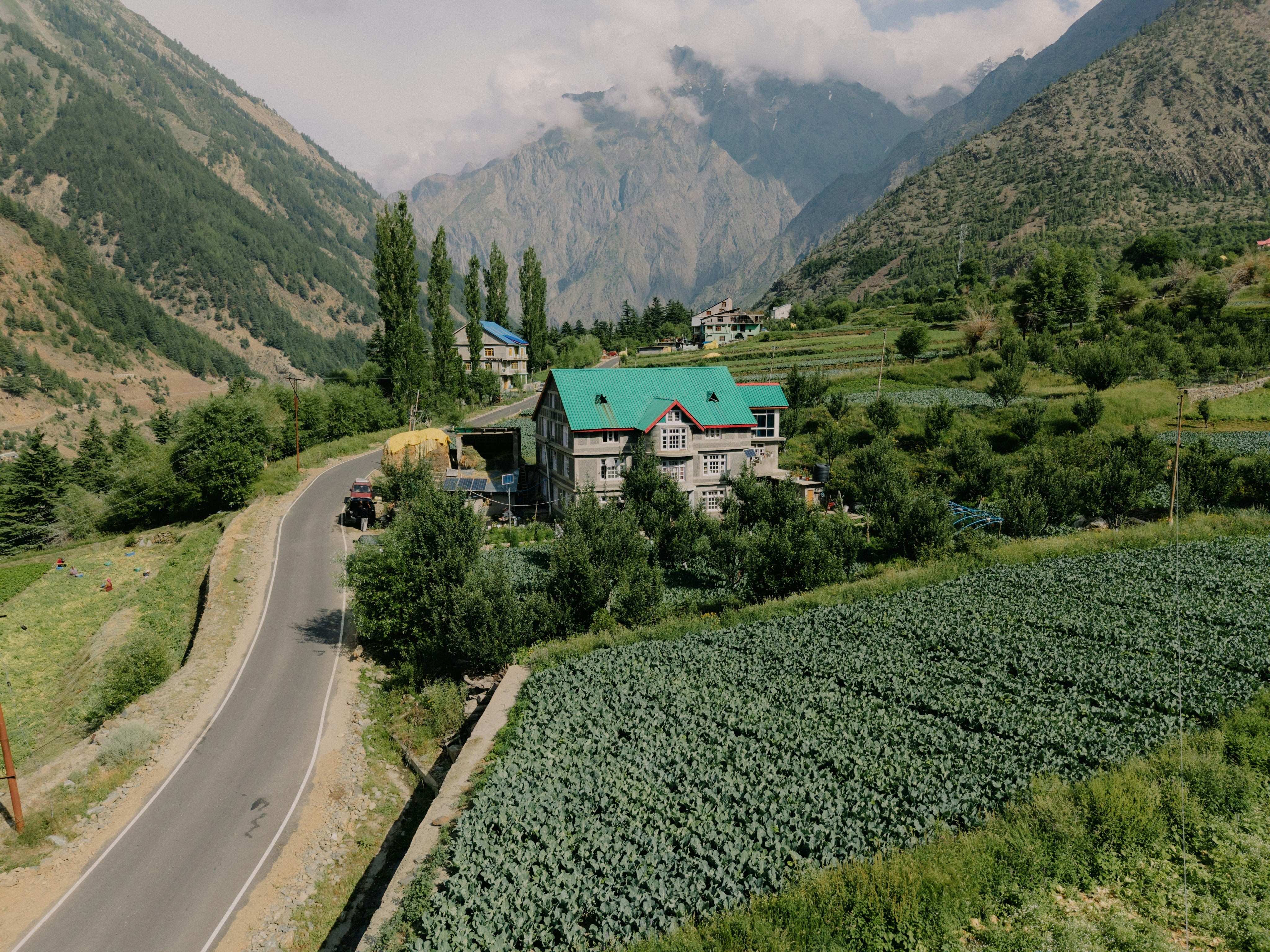 Scenic landscape of mountains and houses.