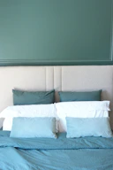 A stylish bed with soft pillows.