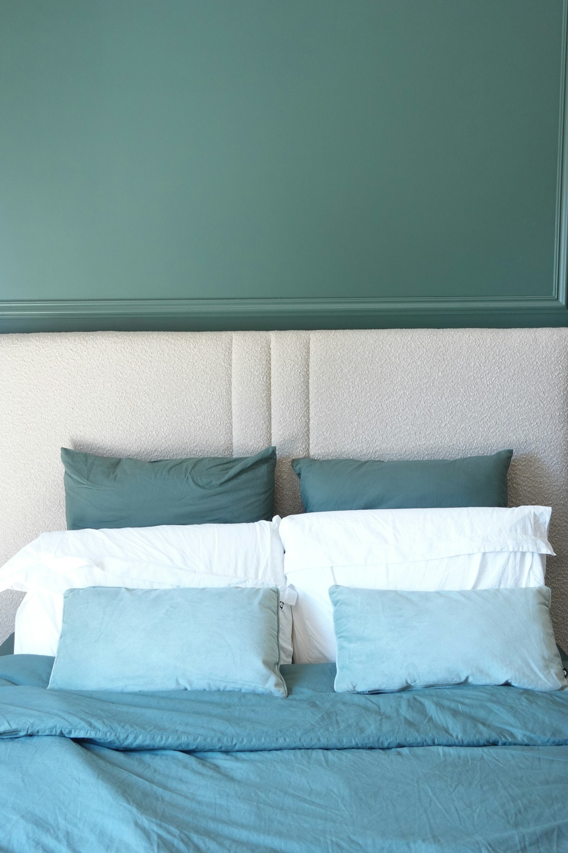 A stylish bed with soft pillows.