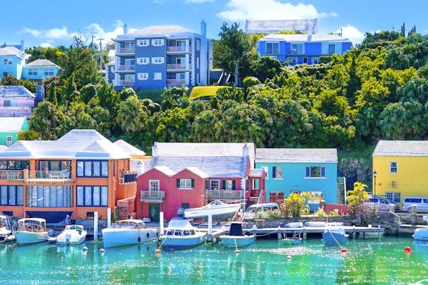 Colorful buildings and boats line the waterfront.